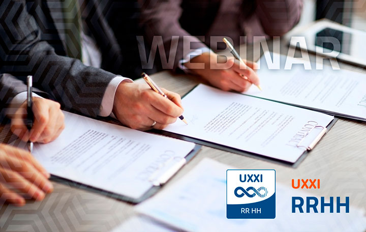 Personas firmando documentos con el logotipo de UXXI-RRHH